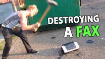 Photo Thumbnail of Destroying a Fax at MattLAN 9